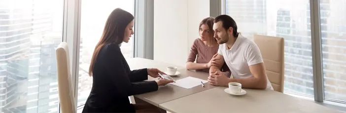 Couple consulting with a Realtor